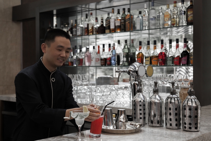 Imagen del bar/restaurante del Hotel Pullman Shanghai Central. Foto 4
