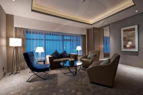 Imagen de la habitación del Hotel Pullman Shanghai Xuhui. Foto 17