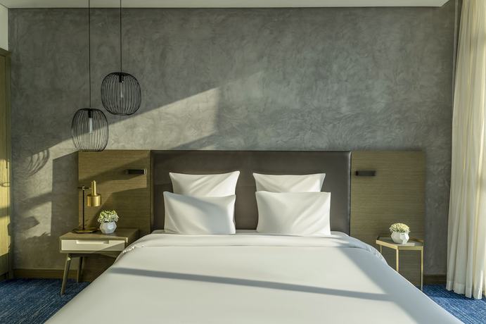 Imagen de la habitación del Hotel Pullman Sharjah. Foto 5