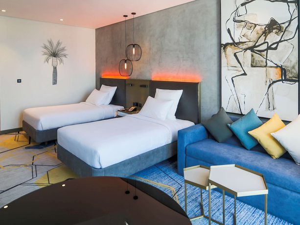 Imagen de la habitación del Hotel Pullman Sharjah. Foto 15