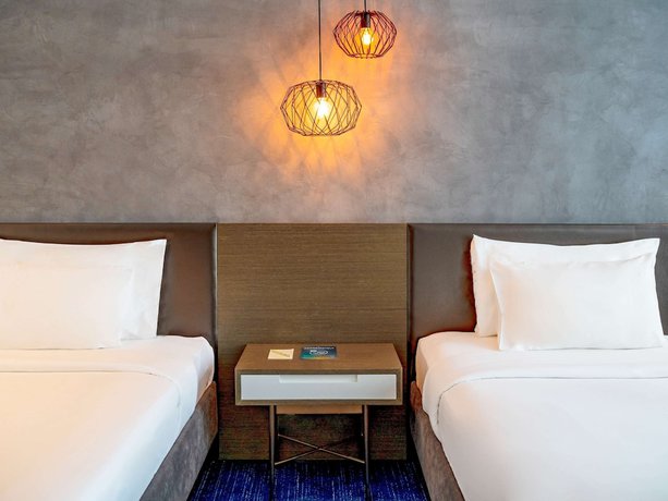 Imagen de la habitación del Hotel Pullman Sharjah. Foto 16