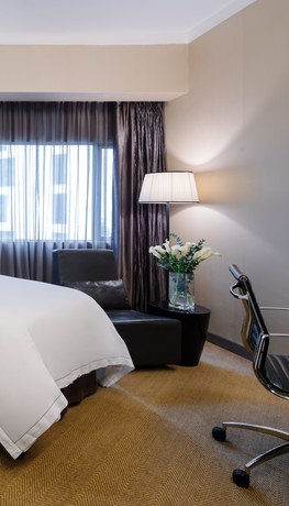 Imagen de la habitación del Hotel Pullman Singapore Orchard. Foto 7