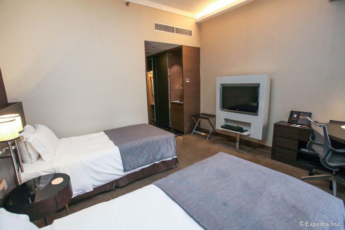 Imagen de la habitación del Hotel Pullman Singapore Orchard. Foto 15