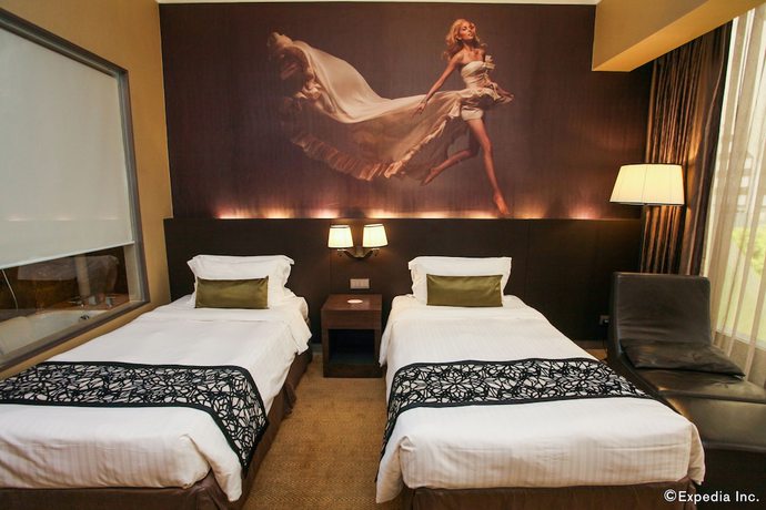 Imagen de la habitación del Hotel Pullman Singapore Orchard. Foto 17