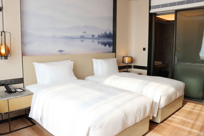 Imagen de la habitación del Hotel Pullman Suzhou Taicang. Foto 8