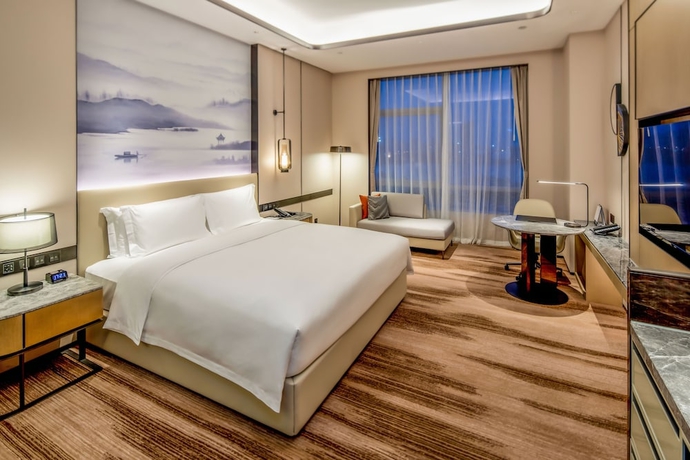 Imagen de la habitación del Hotel Pullman Suzhou Taicang. Foto 10