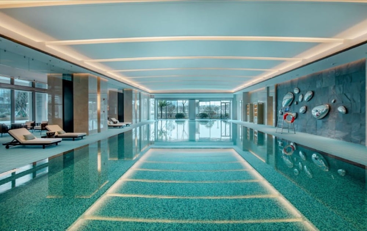 Imagen de la piscina del Hotel Pullman Suzhou Taicang. Foto 15