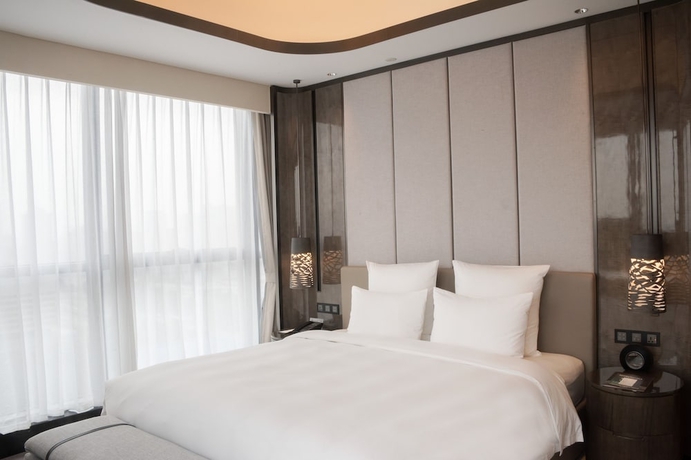 Imagen de la habitación del Hotel Pullman Suzhou Zhonghui. Foto 9