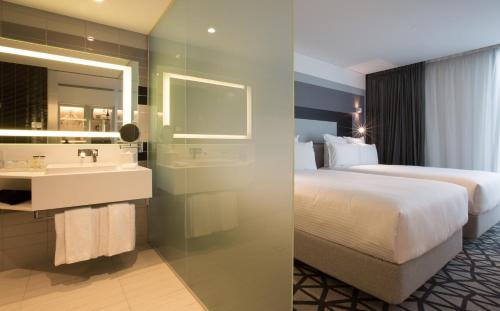 Imagen de la habitación del Hotel Pullman Sydney Airport. Foto 10