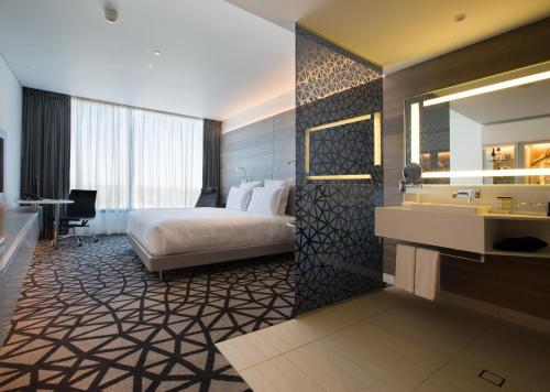 Imagen de la habitación del Hotel Pullman Sydney Airport. Foto 16