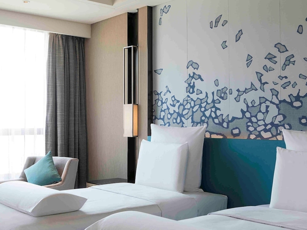 Imagen de la habitación del Hotel Pullman Taiyuan. Foto 11