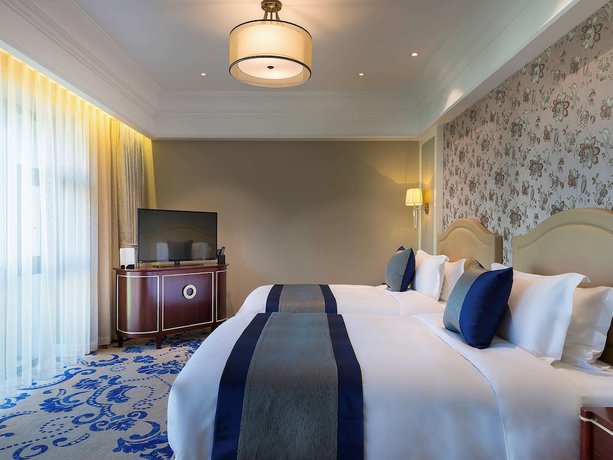 Imagen de la habitación del Hotel Pullman Tangshan. Foto 5