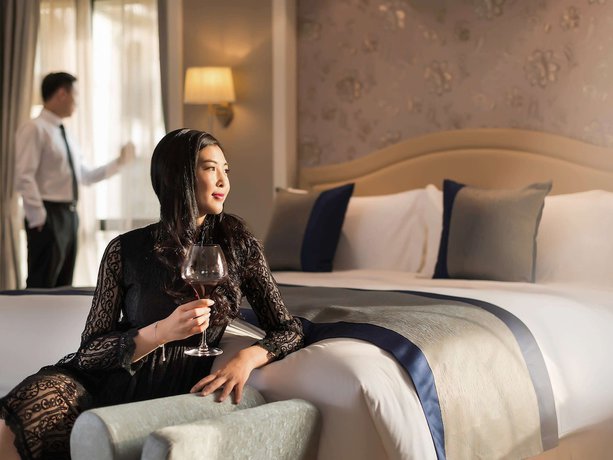 Imagen de la habitación del Hotel Pullman Tangshan. Foto 7