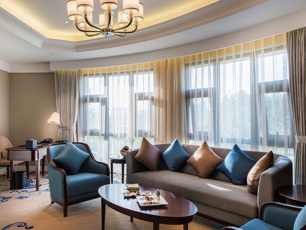 Imagen de la habitación del Hotel Pullman Tangshan. Foto 11