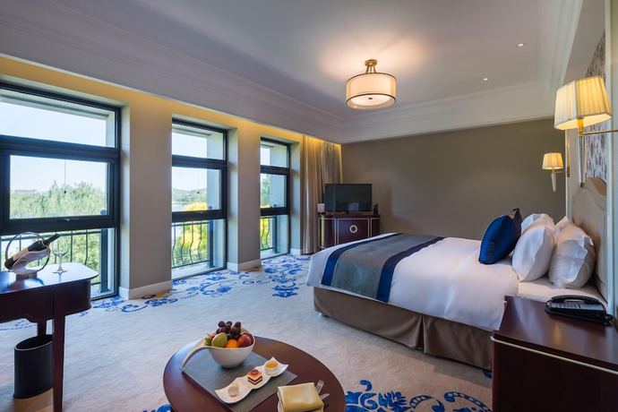 Imagen de la habitación del Hotel Pullman Tangshan. Foto 15