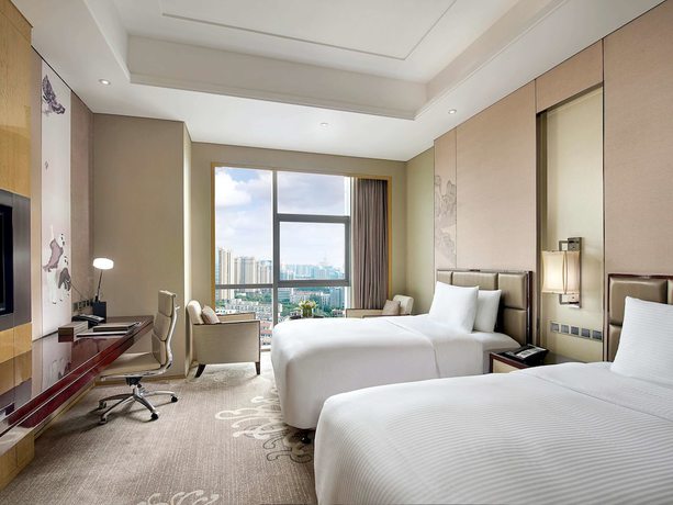 Imagen de la habitación del Hotel Pullman Weifang. Foto 11