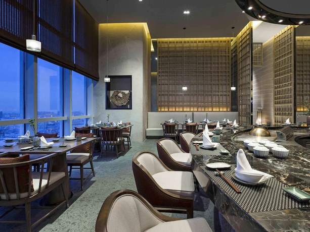 Imagen del bar/restaurante del Hotel Pullman Yantai Center. Foto 3
