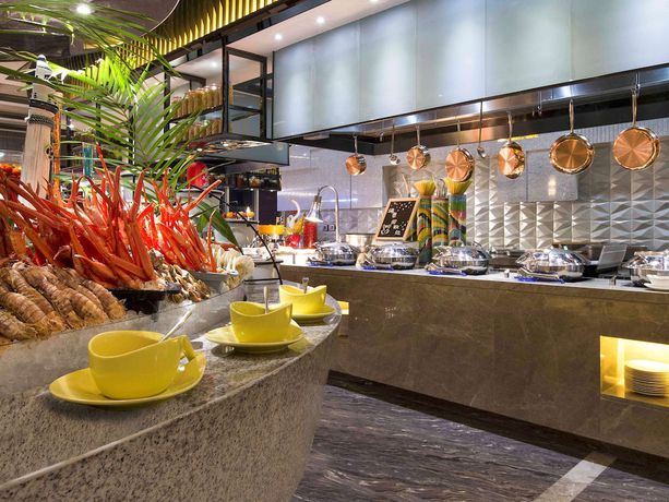 Imagen del bar/restaurante del Hotel Pullman Yantai Center. Foto 8