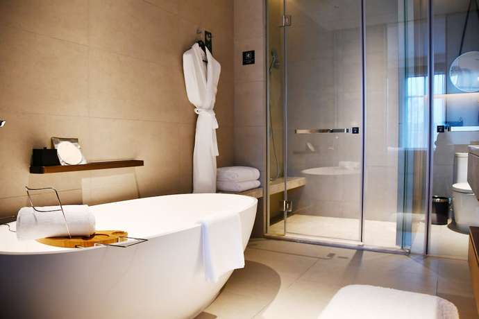 Imagen de la habitación del Hotel Pullman Yueyang Hotel. Foto 11