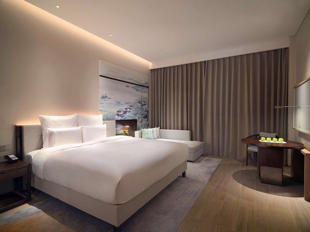 Imagen de la habitación del Hotel Pullman Yueyang Hotel. Foto 14