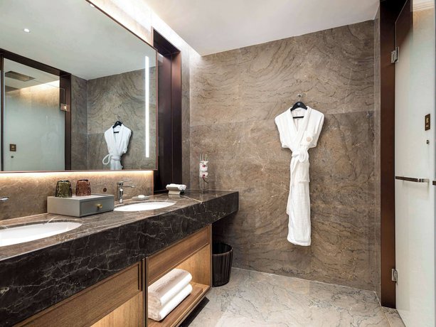 Imagen de la habitación del Hotel Pullman Yuxi. Foto 9