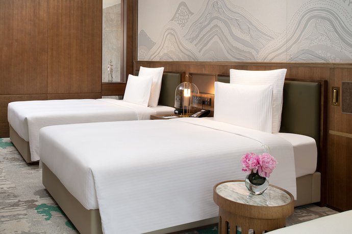 Imagen de la habitación del Hotel Pullman Yuxi. Foto 13