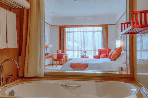 Imagen de la habitación del Hotel Pullman Zhangjiajie. Foto 11