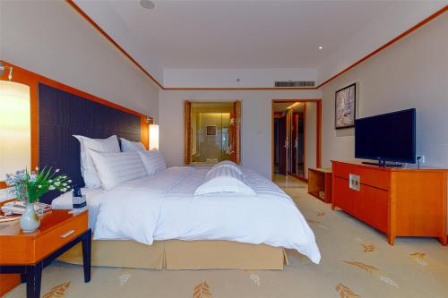 Imagen de la habitación del Hotel Pullman Zhangjiajie. Foto 12
