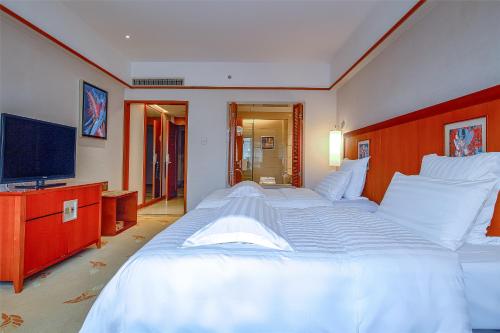 Imagen de la habitación del Hotel Pullman Zhangjiajie. Foto 13