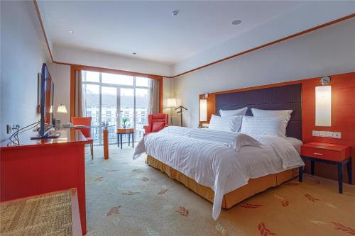 Imagen de la habitación del Hotel Pullman Zhangjiajie. Foto 16