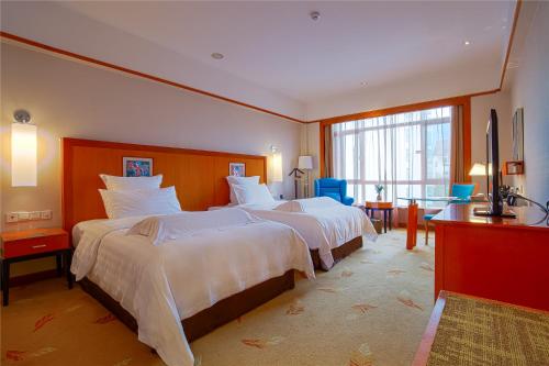 Imagen de la habitación del Hotel Pullman Zhangjiajie. Foto 18