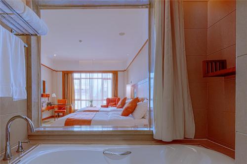 Imagen de la habitación del Hotel Pullman Zhangjiajie. Foto 20