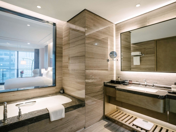 Imagen de la habitación del Hotel Pullman Zhoushan Seaview. Foto 2