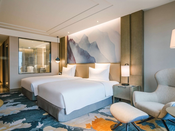 Imagen de la habitación del Hotel Pullman Zhoushan Seaview. Foto 14