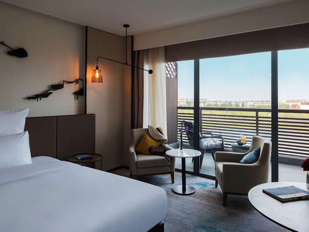 Imagen de la habitación del Hotel Pullman Zhouzhuang. Foto 3