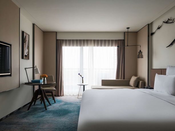 Imagen de la habitación del Hotel Pullman Zhouzhuang. Foto 4