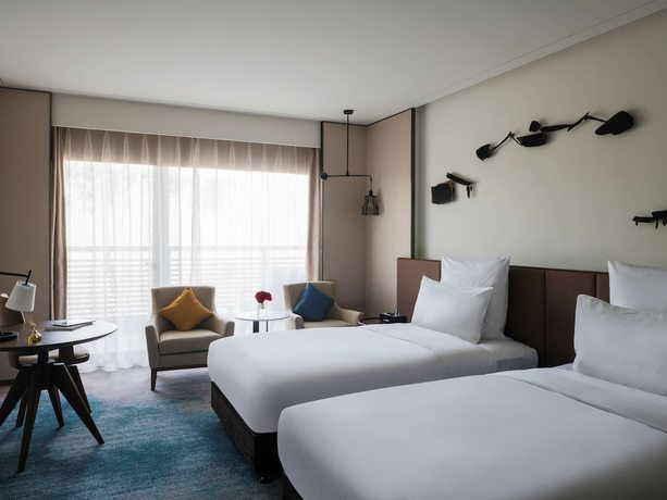 Imagen de la habitación del Hotel Pullman Zhouzhuang. Foto 7