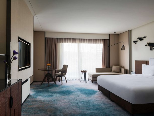 Imagen de la habitación del Hotel Pullman Zhouzhuang. Foto 9