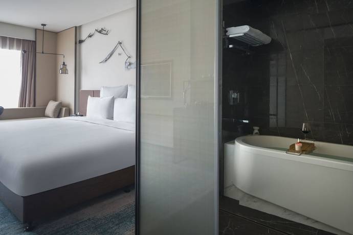 Imagen de la habitación del Hotel Pullman Zhouzhuang. Foto 11
