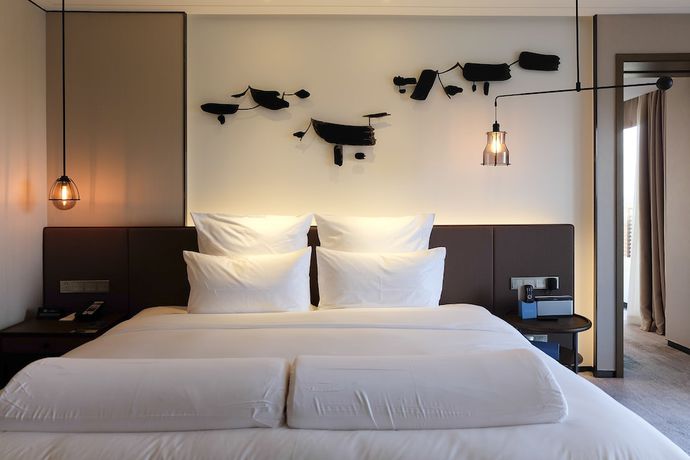 Imagen de la habitación del Hotel Pullman Zhouzhuang. Foto 12