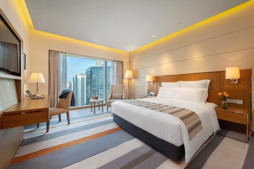 Imagen de la habitación del Hotel Pullman Zhuhai. Foto 14