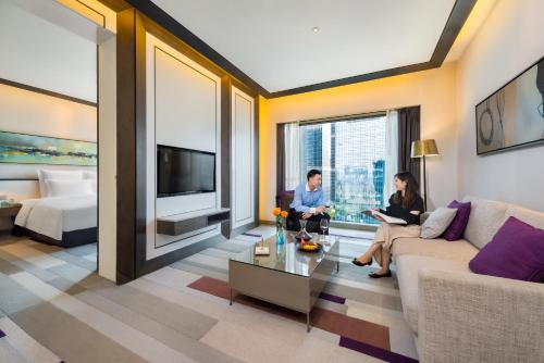 Imagen de la habitación del Hotel Pullman Zhuhai. Foto 16