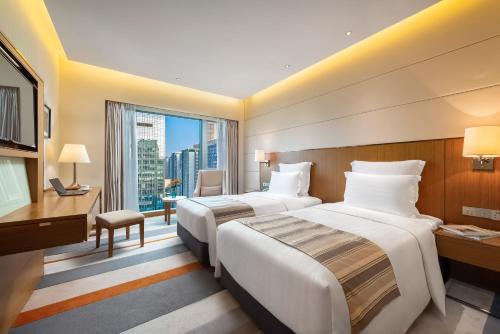 Imagen de la habitación del Hotel Pullman Zhuhai. Foto 17