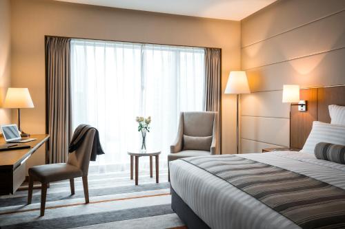 Imagen de la habitación del Hotel Pullman Zhuhai. Foto 18