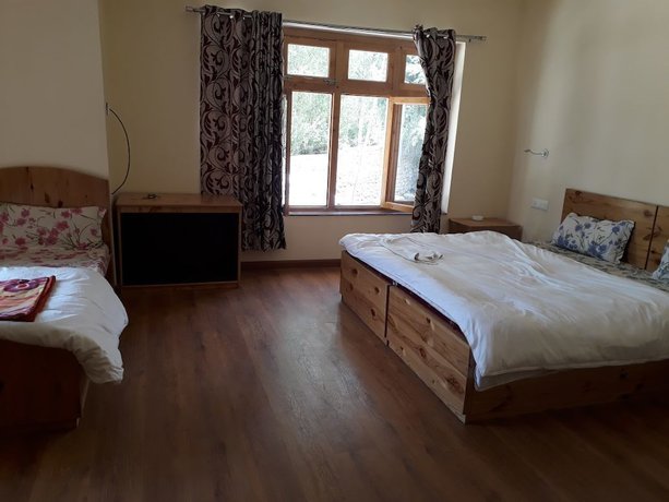 Imagen de la habitación del Hotel Puma House, Leh. Foto 10