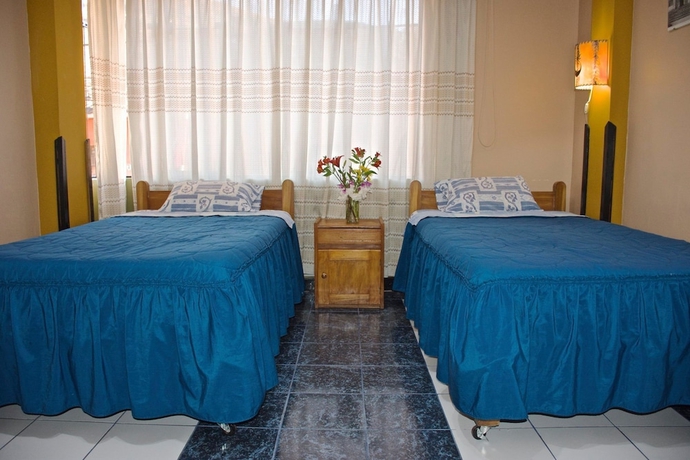 Imagen de la habitación del Hotel Pumawanka Hostal. Foto 8