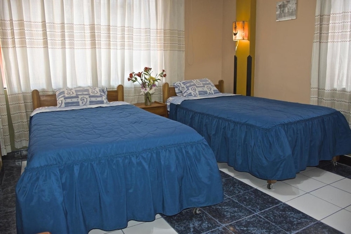 Imagen de la habitación del Hotel Pumawanka Hostal. Foto 9