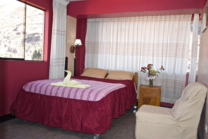 Imagen de la habitación del Hotel Pumawanka Hostal. Foto 10