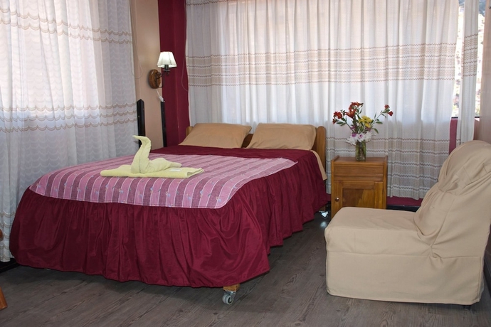 Imagen de la habitación del Hotel Pumawanka Hostal. Foto 11