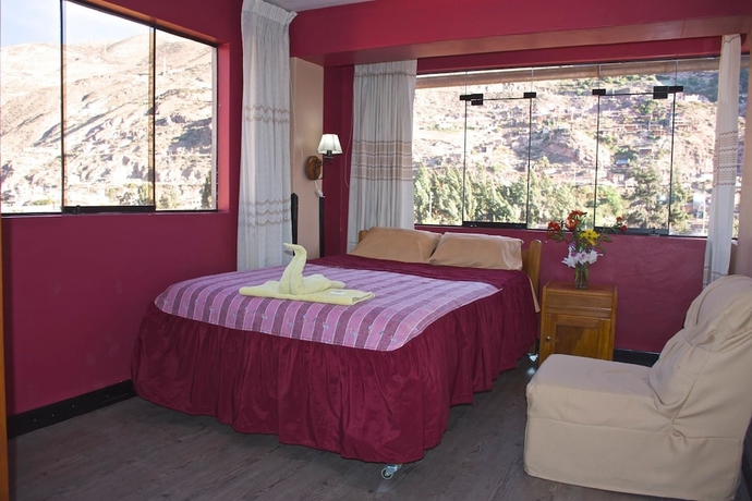Imagen de la habitación del Hotel Pumawanka Hostal. Foto 13
